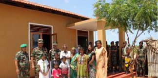Deserving families receive new houses