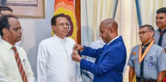 The official flag of SERTORA 2018 pinned on President