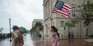 ‘Once in a lifetime’ hurricane weakens, begins lashing eastern US