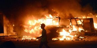 protesters torch Iran consulate