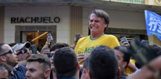 The far-right politician was attacked in the midst of a crowd in the south-eastern state of Minas Gerais.