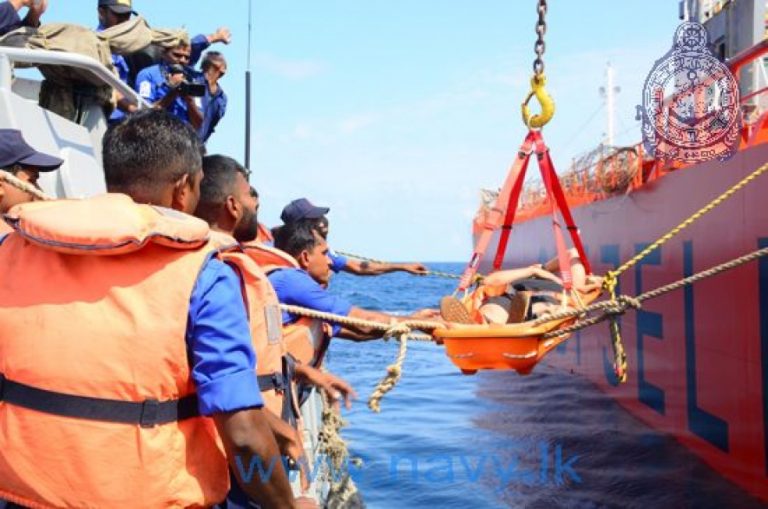 Navy renders assistance to transfer a mariner ashore for treatment