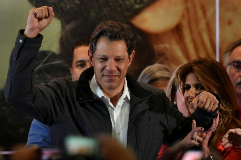 Divided Brazil barrels towards uncertain presidential run-off