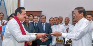 Former President Mahinda Rajapaksa has been sworn in as the Prime Minister before President Maithripala Sirisena, a short while ago.