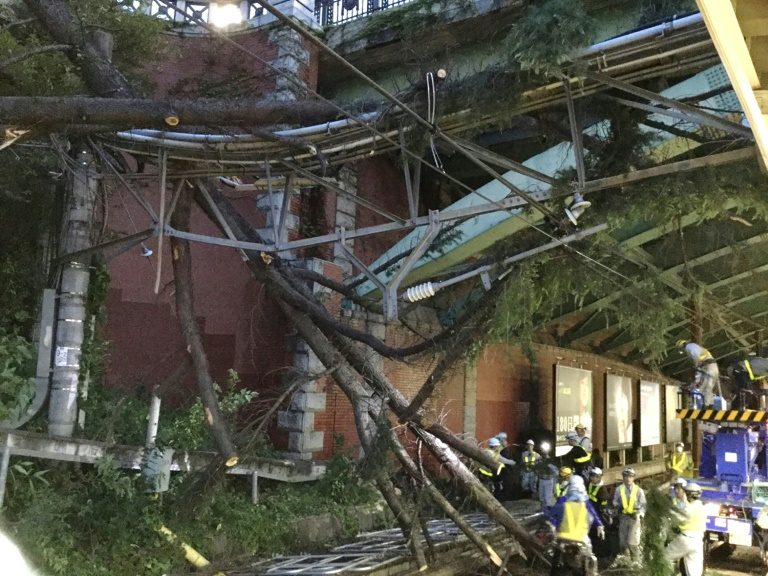 Two dead after typhoon batters Japan