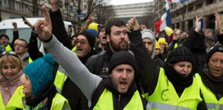Yellow vests back on France’s streets to challenge Macron