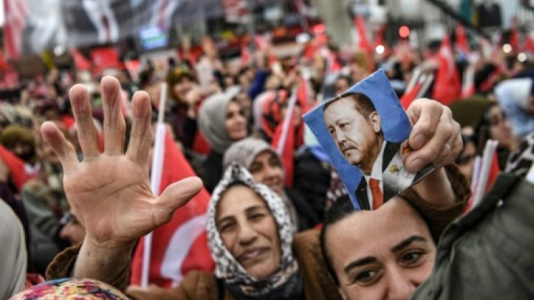 Turks vote in test for Erdogan as recession hits home