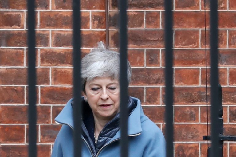 Besieged May pleads with EU to help save her Brexit plan