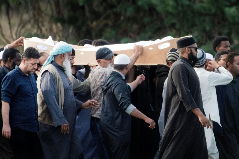 New Zealand burials start as PM urges ‘united front’ on social media