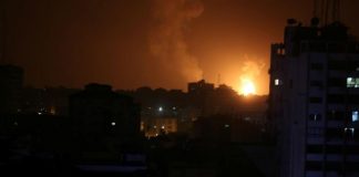 Israel launches dozens of Gaza strikes after rockets target Tel Aviv