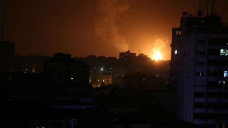 Israel launches dozens of Gaza strikes after rockets target Tel Aviv