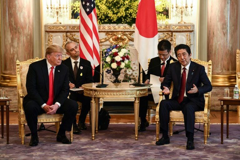 Trump strikes dovish tone on N. Korea, Iran