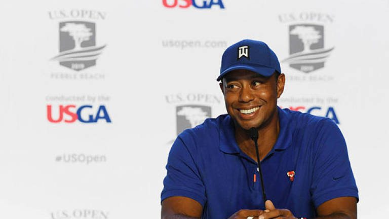 Woods takes stroll down Pebble memory lane