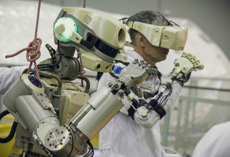 Spacecraft carrying Russian humanoid robot docks at ISS