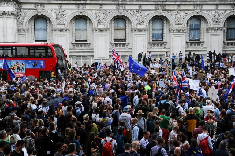 Johnson steps up Brexit talks with EU as faces legal challenges