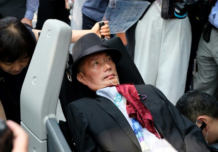 Lawmakers with serious disabilities take seats in Japan parliament