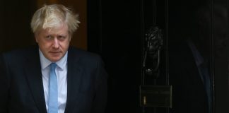 Britain’s Johnson tries to save job and hardline Brexit