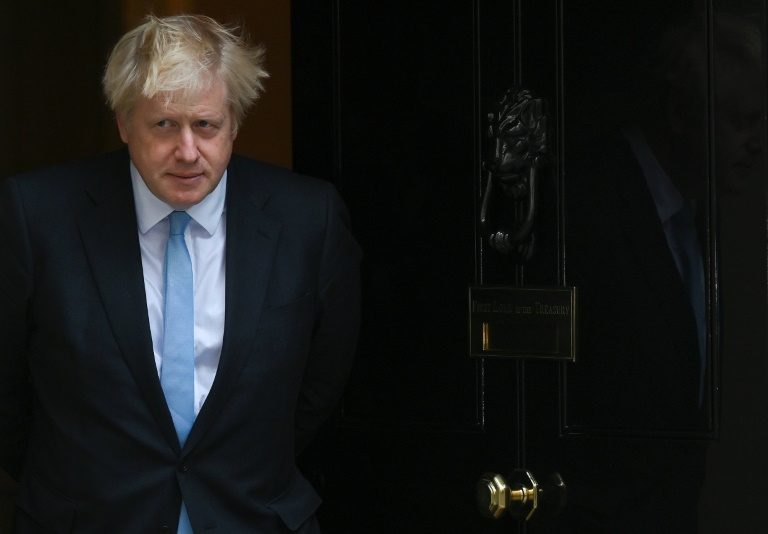 Britain’s Johnson tries to save job and hardline Brexit