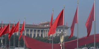 China readies for anniversary, Hong Kong for protest