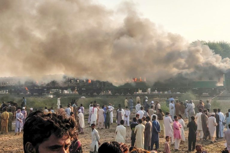 At least 65 killed in Pakistan train fire