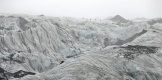 Iceland students see chilling reality of melting glacier