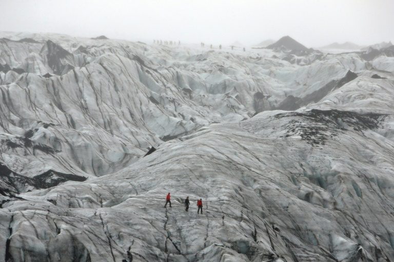 Iceland students see chilling reality of melting glacier