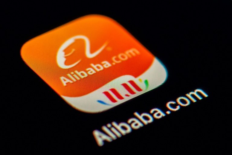Alibaba shares surge almost 8% on Hong Kong debut