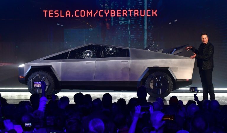 Tesla and Ford trade challenges in macho truck world