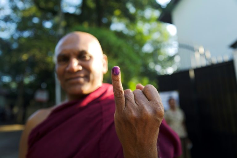 Rajapaksas eye comeback in tense Sri Lanka election