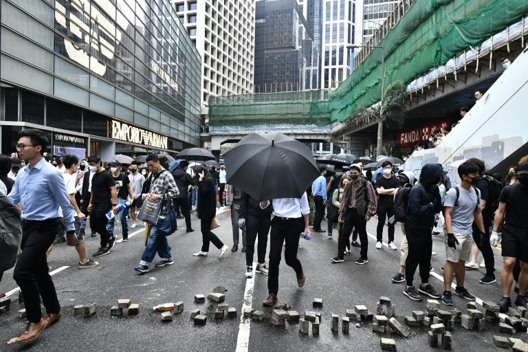 Chaos in Hong Kong as pro-democracy protests ‘blossom everywhere’