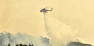 Australia orders evacuation of fire-ravaged towns before heatwave