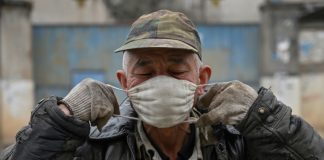 Experts say China virus outbreak will last months at least