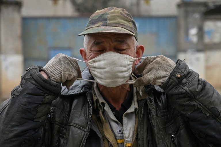 Experts say China virus outbreak will last months at least