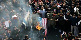 Huge crowds in Iran mourn general killed by US drone