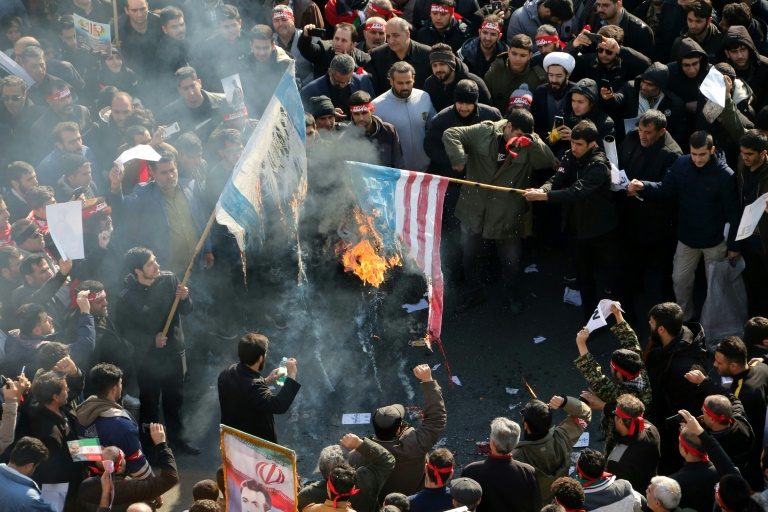 Huge crowds in Iran mourn general killed by US drone