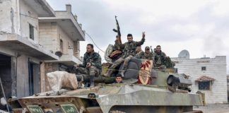 Syria army says retakes key northwest town