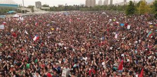 Thousands of Chilean protesters welcome 2020