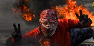 Iraqi protesters dig in heels despite new PM-designate