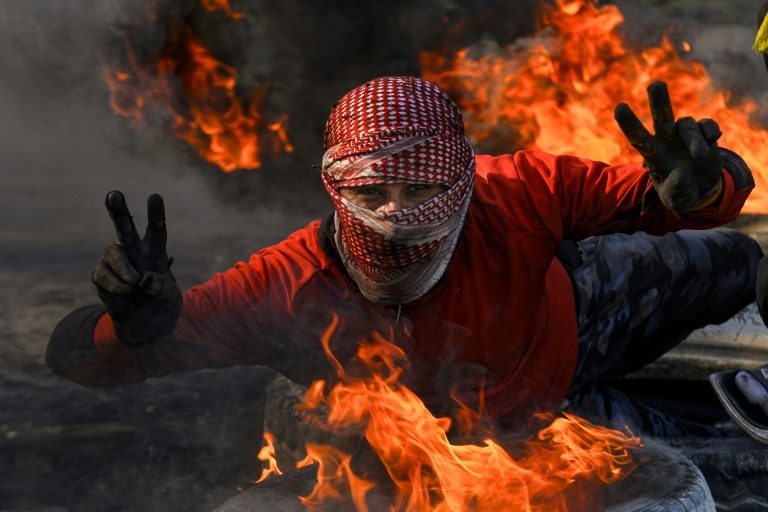 Iraqi protesters dig in heels despite new PM-designate