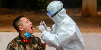 Virus death toll soars as China changes counting methods