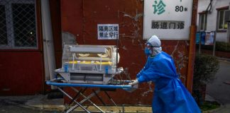 China virus cases drop as foreign fears rise