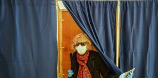 Hand gel at the ballot box as France votes amid virus clampdown