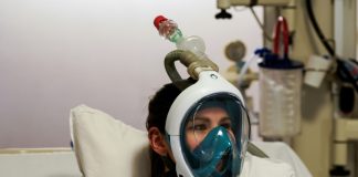 Hospitals turn to snorkel masks to ease respirator overload