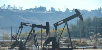 Oil prices extend losses on price war, virus fallout