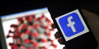 Facebook surges on user growth in pandemic, sees murky outlok