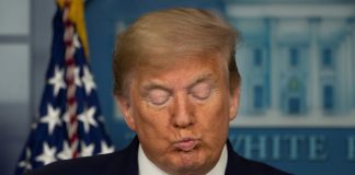 Trump backs US health secretary, lashes media