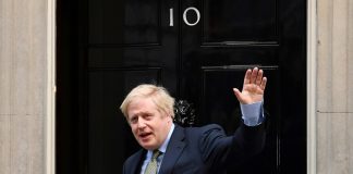 Virus-hit British PM back to work with hope but no lockdown change