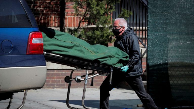 US COVID-19 deaths climb past 60,000, according to Johns Hopkins data