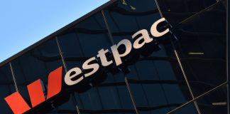 Westpac half-year profits tumble more than 60%