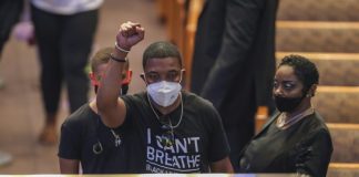 Thousands mourn George Floyd as accused officer appears in court